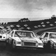 The No. 11 car of Darrell Waltrip starts the 1981 NASCAR season in a Mountain Dew-sponsored race car at Daytona International Speedway. That Daytona 500 kicked off the (unofficial) farewell season for green as a color of bad luck in NASCAR, as Waltrip won 12 races and the championship. Photo credit: AP Photo/Phil Sandlin